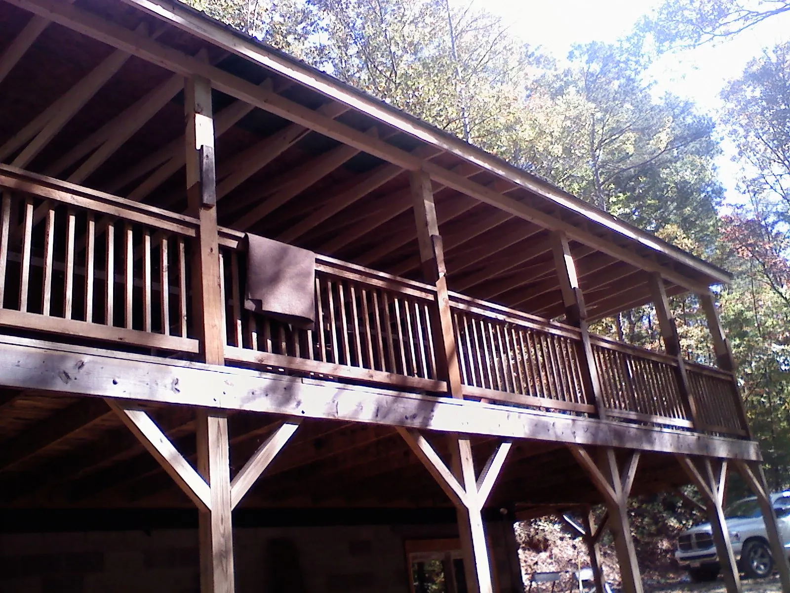 Timber framing under a new elevated porch and deck — Roof Leak Repair in Hampshire by Roofing Brothers